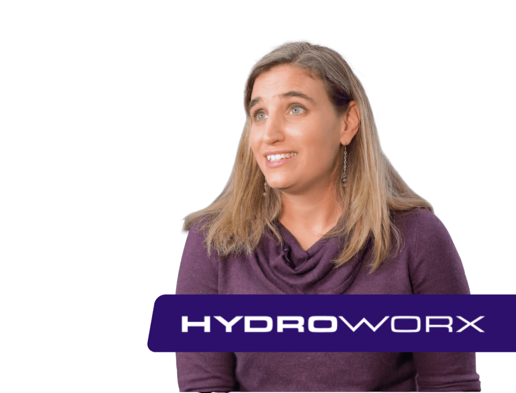 Woman in purple, looking right, HYDROWORX logo below.
